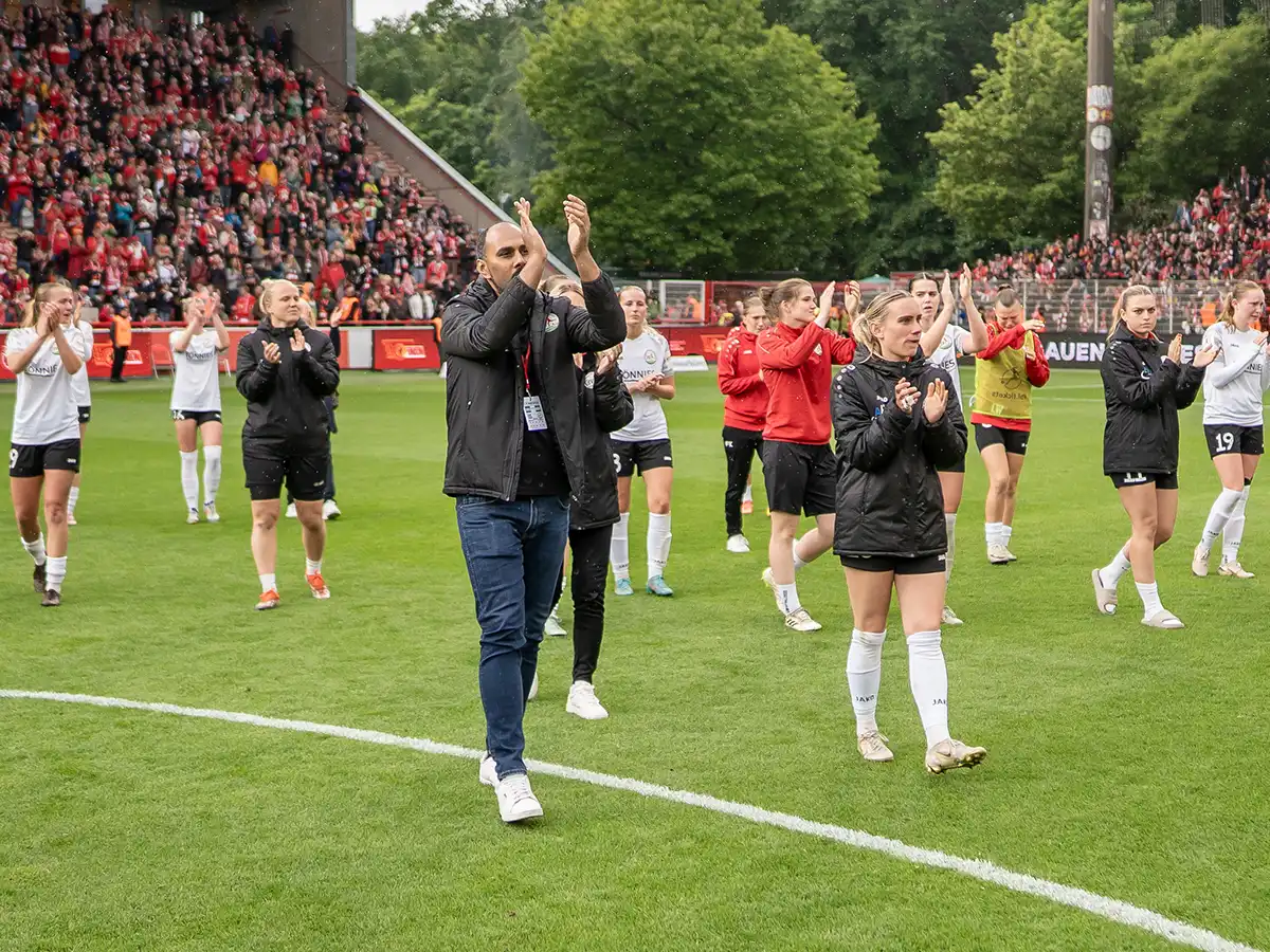 Chris Punnakkattu Daniel with FSV Gütersloh team at Union Berlin's Stadion An der Alten Försterei
